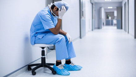 exhausted surgeon.jpg