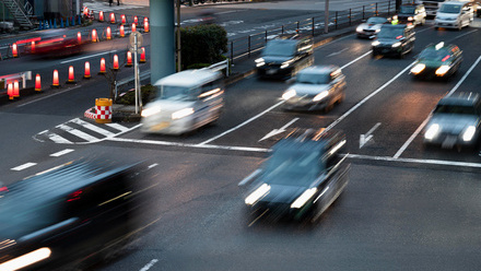 people-driving-cars-city-street.jpg